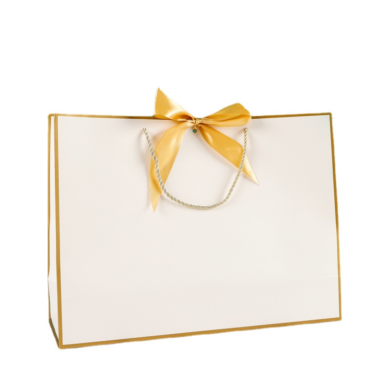 Fábrica al por mayor arco bolsa de papel portátil ropa bolsa de embalaje bolso de cartón blanco con logotipo impreso