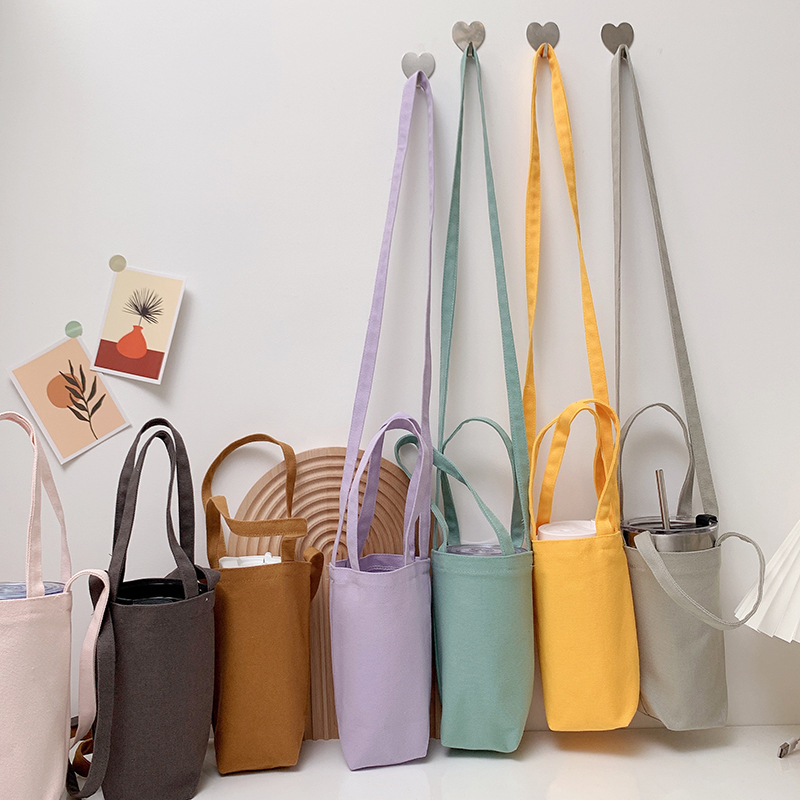 Bolsa de lona creativa portátil crossbody bolsa de paraguas bolsa de teléfono móvil cubierta de la caldera botella de agua bolsa de leche té aislado taza de agua cubierta