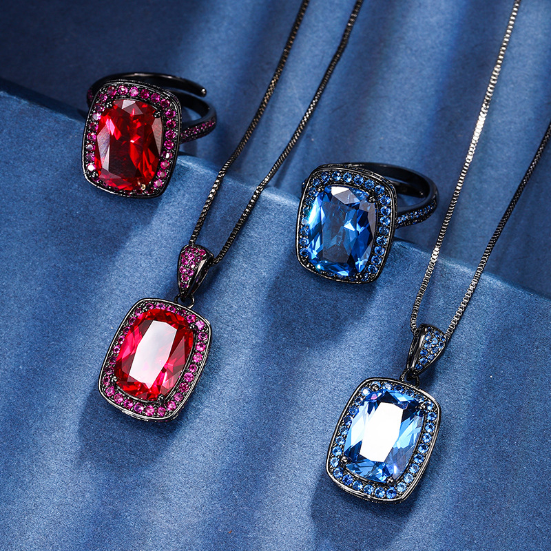 Zhuang Shengsheng Jewelry Fondo de cobre chapado en oro simulación corindón rojo cristal puntiagudo azul temperamento cuadrado gordo traje de oro negro mujer 10*14