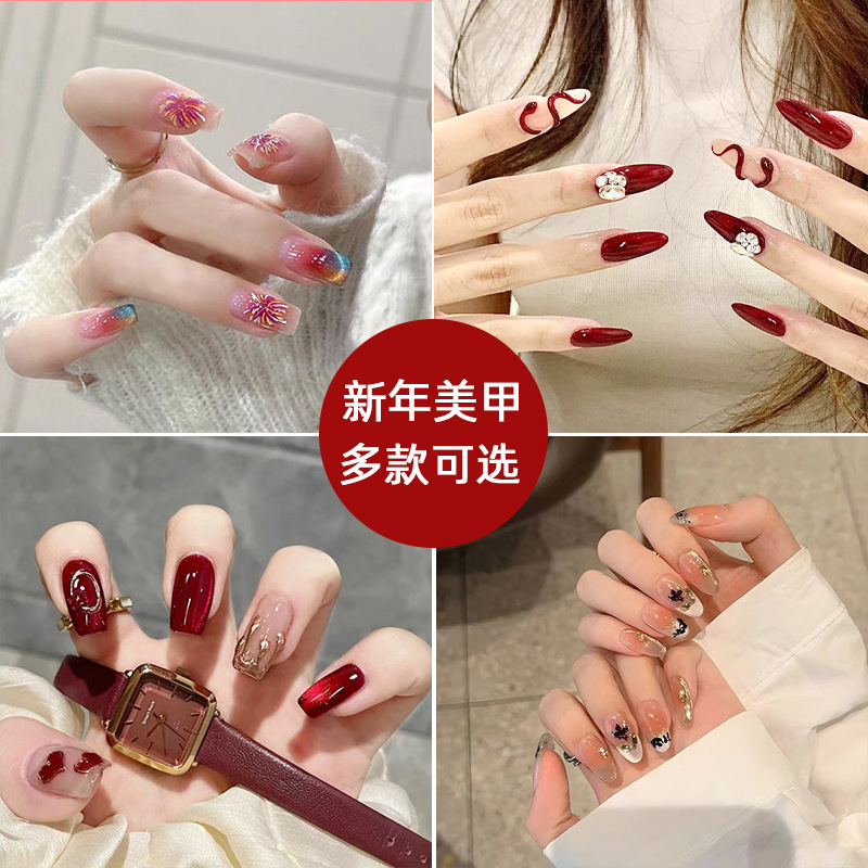 Arte de uñas al por mayor para Año Nuevo, arte de uñas hecho a mano con tendencia nacional roja del Año de la Serpiente, pegatinas de uñas con efecto ojo de gato y fuegos artificiales con un toque de alta gama.