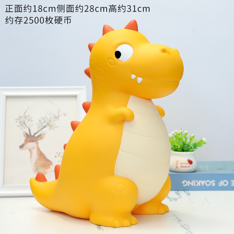 La decoración del hogar de la alcancía de los niños lindos de dibujos animados transfronterizos puede entrar y salir de la alcancía de dinosaurio resistente a la caída