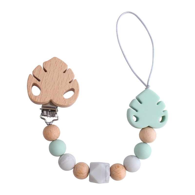 Suministros para bebés creativo clip de chupete de hoja de haya juguete mordedor bebé Cadena de chupete de hoja de silicona cadena anti-caída