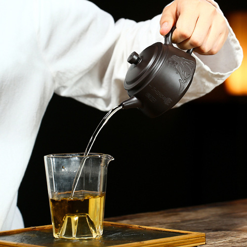 Yixing teapot wholesale new black mud tea Zen blind purple clay teapot famous artist carved tea set micro business delivery