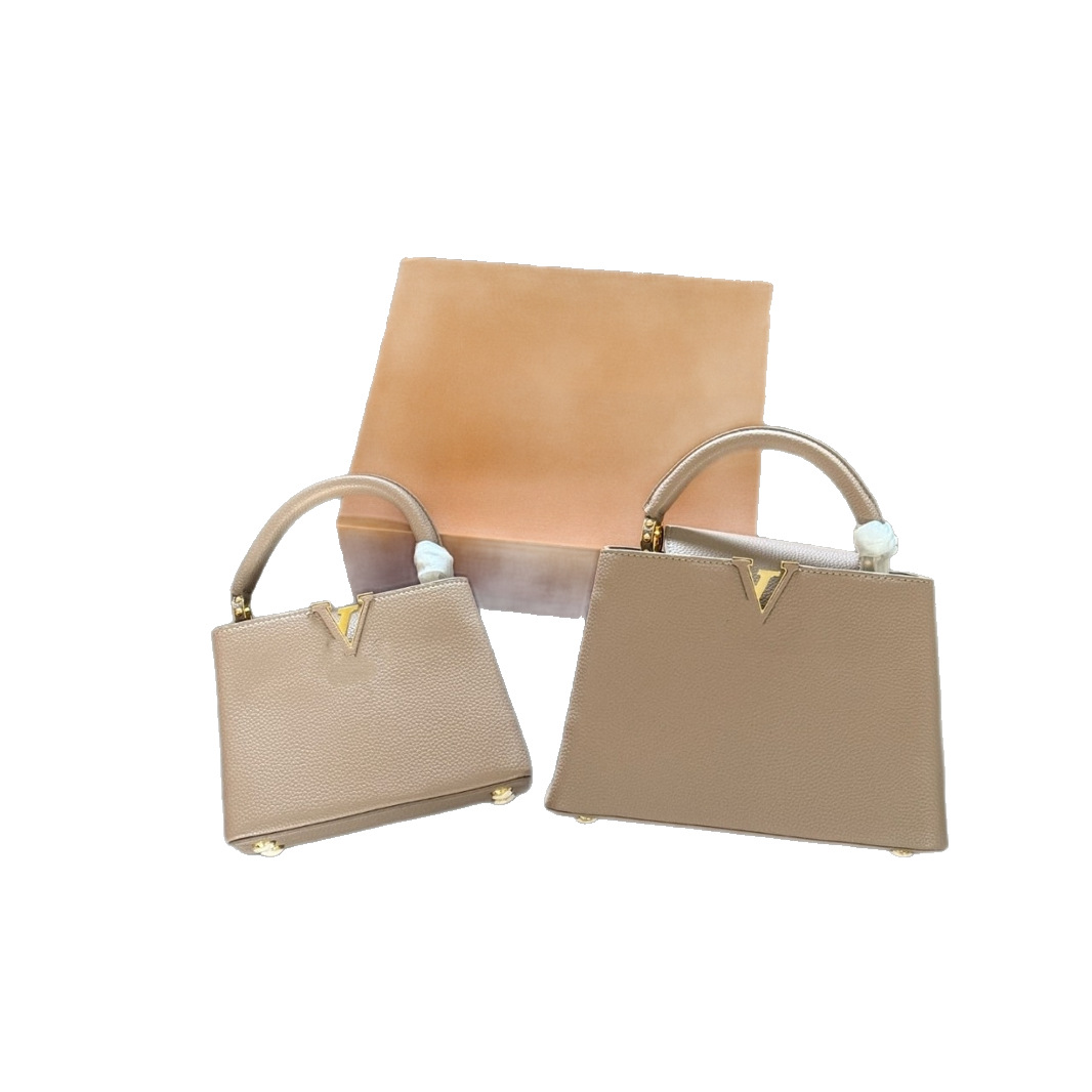 Nuevo modelo de bolso LV Capucines, hecho de cuero Taurillon de grano completo, se puede usar como bolso de mano o bandolera.