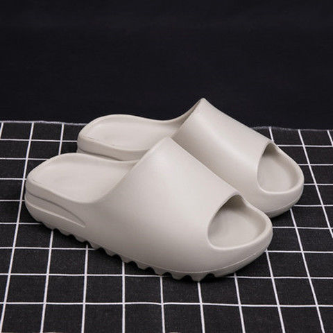 Lu Langsen online celebridad pareja Coco alta sensación de plástico elástico caminar en casa mierda zapatillas de playa de fondo grueso en stock