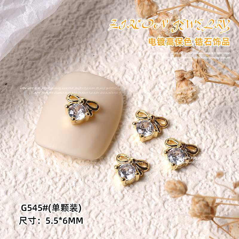 Nueva luz de la celebridad Internet lujo circón Super Flash Perla Cadena amor mariposa colgante uñas Oro Cielo Estrellado Estrella Diamantes