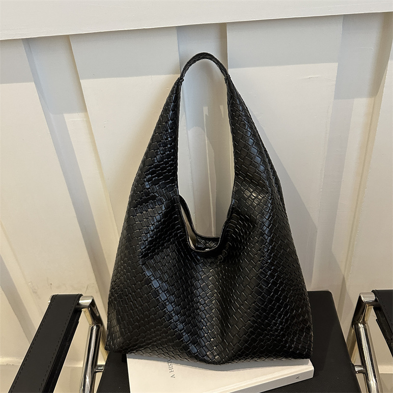 Otoño y invierno retro bolsos de dos piezas 2024, bolsos de moda de mujer, bolsos de hombro portátiles extranjeros, bolsos simples.