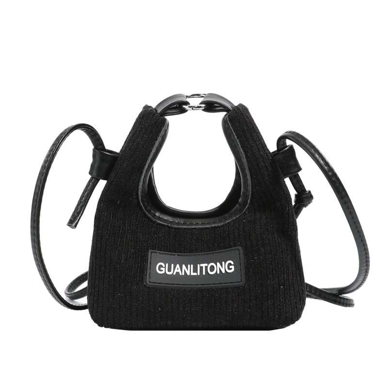 Bolso de niña de color sólido coreano lindo mini mochila de bebé otoño invierno nuevo bolso de hombro para niños de lana
