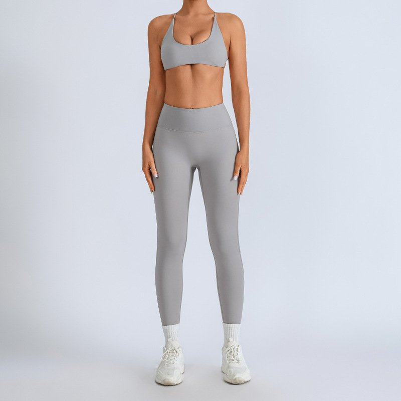 Traje de yoga europeo y americano transfronterizo, espalda hermosa con almohadilla para el pecho, sujetador con tirantes cruzados, pantalones deportivos de secado rápido de melocotón de cintura alta