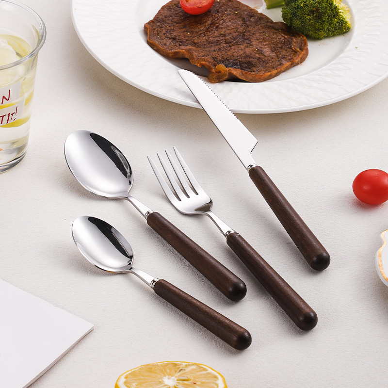 Japanese-style 304 stainless steel cutlery set with wooden handle, including knife, fork, and spoon for Western restaurants, including a pointed spoon, steak knife, and serving spoon and fork