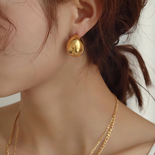 European and American cross-border crescent semicircle titanium steel hollow earrings 18K gold-plated glossy geometric stainless steel earrings wholesale