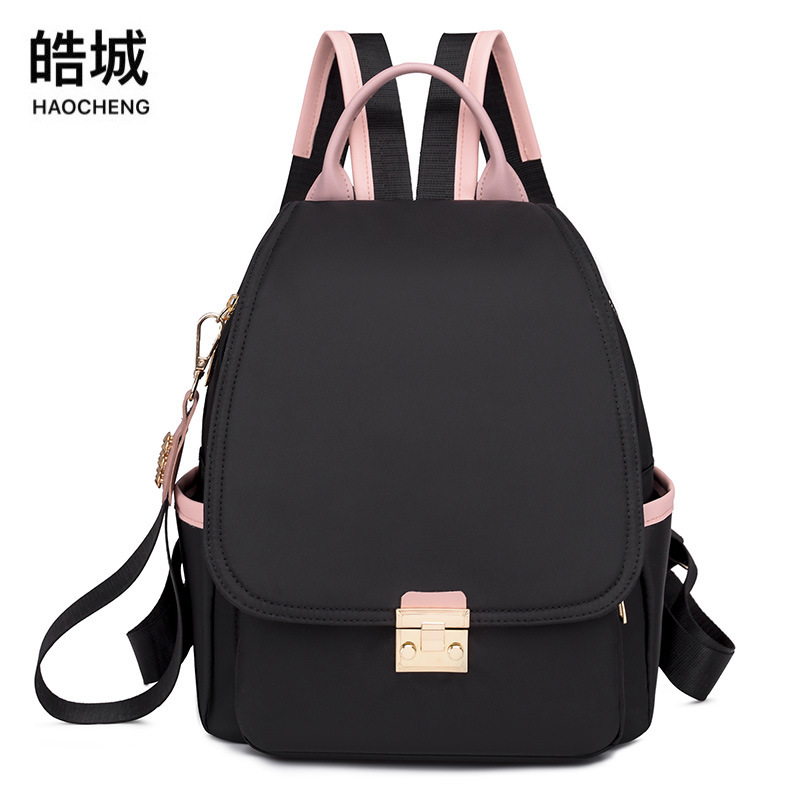 Bolsos mujer 2023 nueva mochila antirrobo coreana moda femenina todo fósforo nicho color de contraste mochila de viaje al por mayor