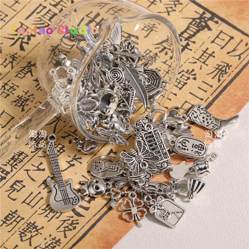 Mezcla de plata antigua brillante plata colgante de perlas DIY accesorios de joyería tubo de perlas dobladas tubo de flor colgante de diafragma brazalete de tres vías