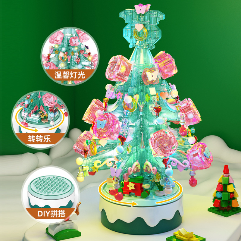 子供のクリスマスツリーの照明のオルゴールの小さい粒子の益智は積み木のおもちゃのクリスマスを詰めてアイデアの贈り物を並べます。|undefined