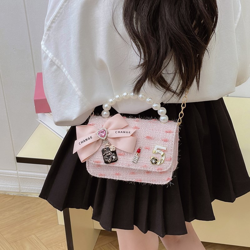 Bolso de cinturón para niños bolso de cambio pequeño viento perla de moda bolso de arco bolso de niña linda