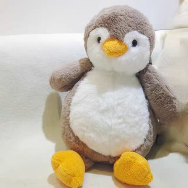 Peluche de 25 cm para máquina de agarre, muñeco suave ideal para regalos o eventos.