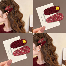 �ﶬС���L�tɫë�q�l�AŮ�߼��Ђ�߅�����A�nϵ������y�l���^�