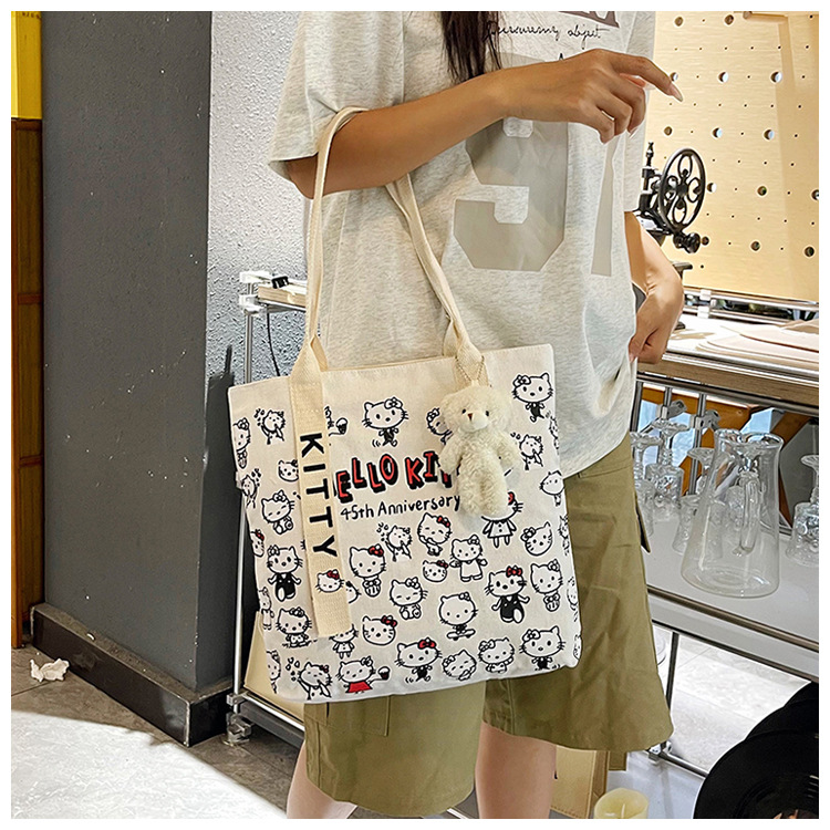 The new fashionable cartoon canvas bag, simple and versatile tote bag, cute commuting single-shoulder tote large bag, is selling well across borders undefined
