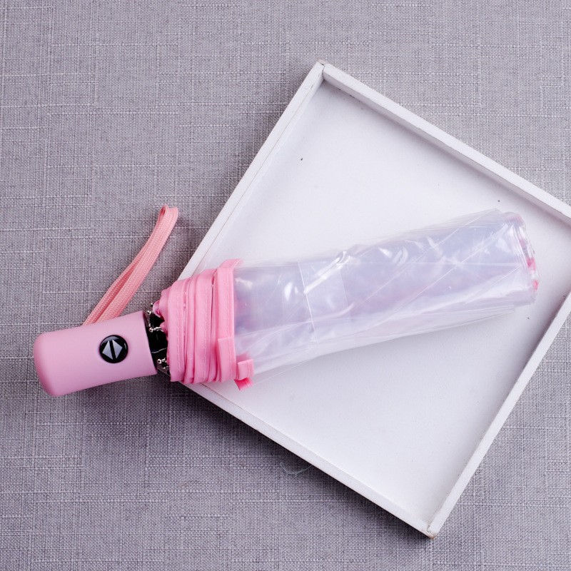 Paraguas transparentes coreanos para mujeres plegables totalmente automáticos tres plegables para estudiantes pequeños frescos lindos dibujos animados engrosados