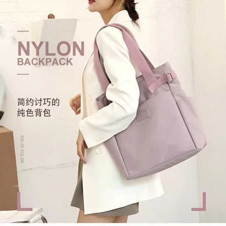 Nuevo bolso de lona, bolso de tela de nailon, bolso informal japonés transfronterizo de gran capacidad con múltiples bolsillos