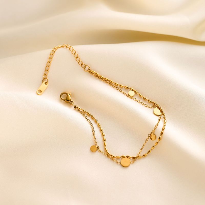 New Titanium Steel Niche 18K Gold Double-Layer Rice Chain Shiny Small Disc Bracelet Women's Exquisite Versatile Anklet Jewelry New Titanium Steel Niche 18K Gold Double-Layer Rice Chain Shiny Small Disc Bracelet Women's Exquisite Versatile Anklet Jewelry