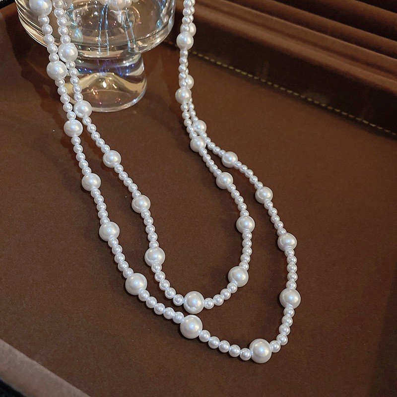 Collar con cuentas de perlas de gota de agua con diamantes transfronterizos otoño e invierno cadena de suéter de lujo ligero francés moda todo fósforo joyería de alta gama