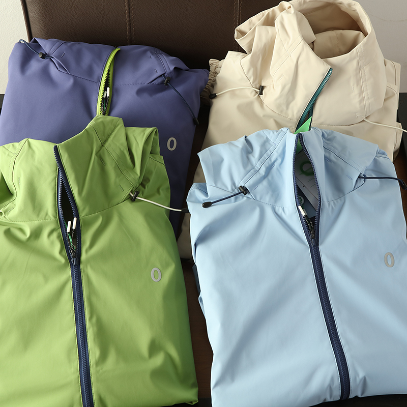 Foreign trade unit price is higher than South Korea single plain family o standard printed hooded outdoor waterproof couple jacket coat