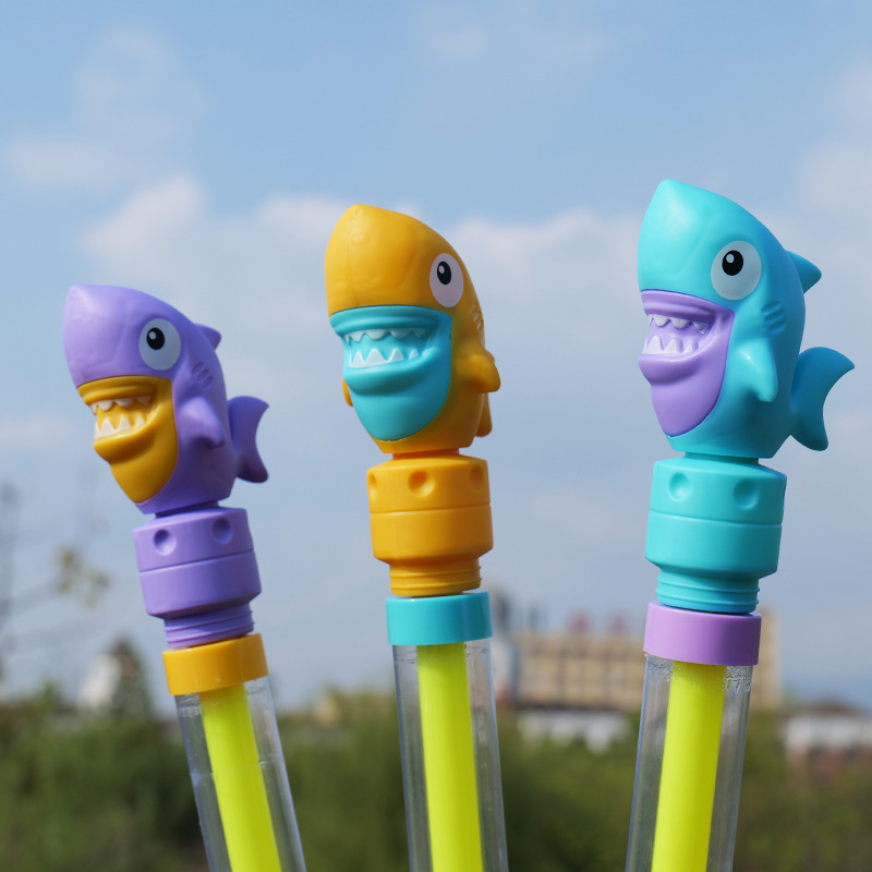 Juguetes del día de los niños Pistola de agua de dibujos animados tipo de extracción de agua de gran capacidad para niños y niñas jugando en la playa juguetes de agua al por mayor