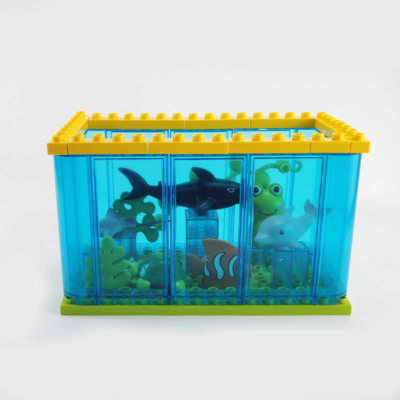 国産の大粒の積み木のばら売りは海洋の世界のサメのイルカの醜い魚の動物の部品のおもちゃをつづり合わせます。
