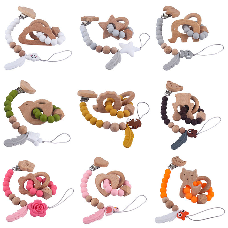 Nuevo bebé suministros calmante haya juguetes animales Cadena de chupete de silicona corona de cinco puntas estrella mordedor traje