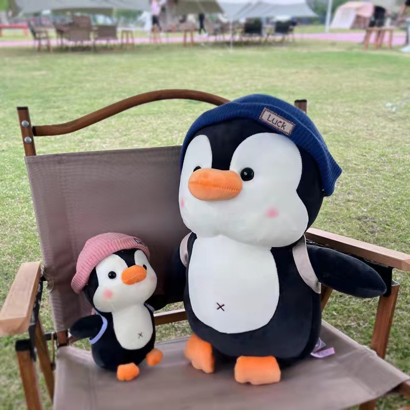 Nuevas lindas mochilas de viaje pingüinos juguetes de peluche muñecas Oceanarium muñecas regalos para niños al por mayor