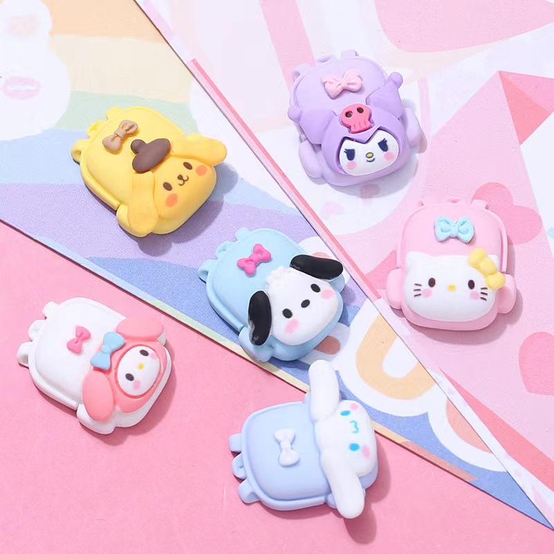 Resina de dibujos animados DIY pegamento crema caja del teléfono accesorios mochila forma melodía Pacha perro Niños Accesorios para el cabello al por mayor