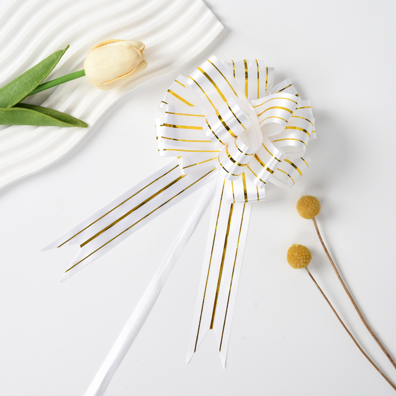 Comercio exterior transfronterizo 30 tres arcos de oro mano de flores regalos de Navidad paquetes de regalos decoración de flores tiradas cinta