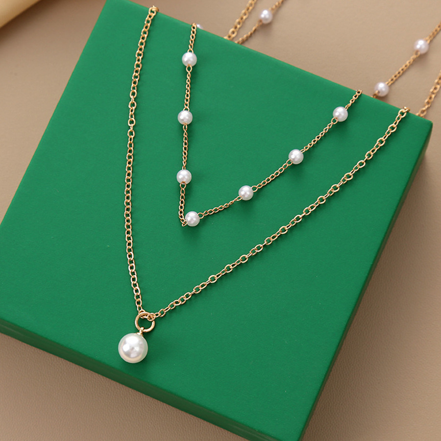 Collana con pendente di perle a strati per donna elegante_voghion.com