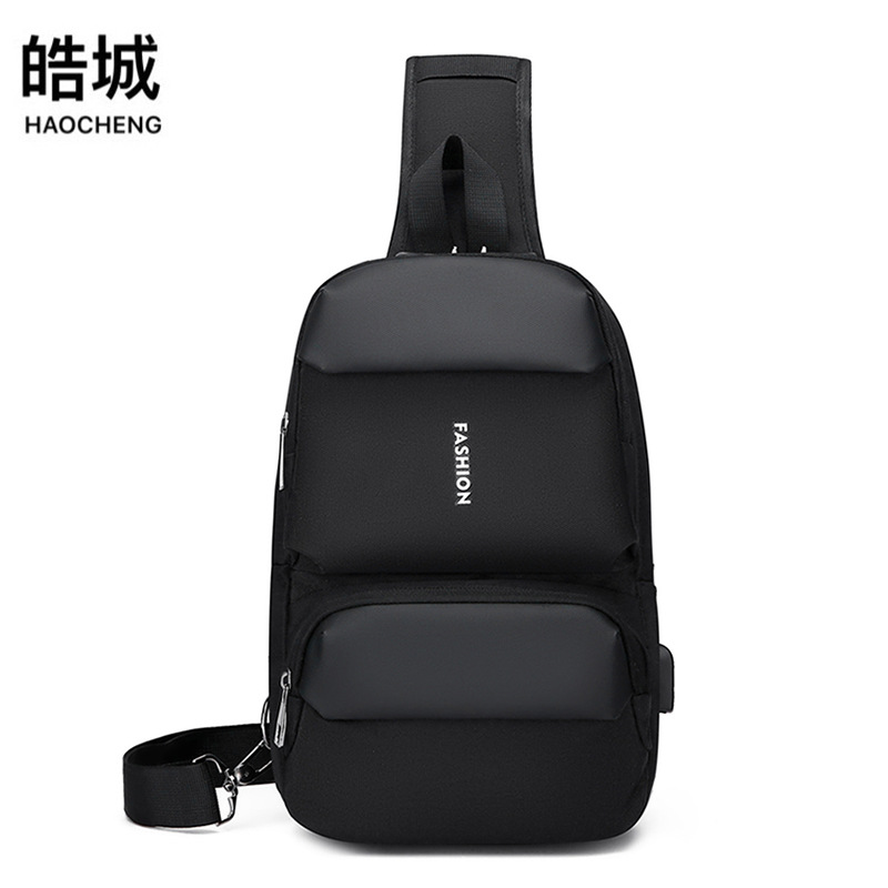 Bolso de pecho de negocios recargable USB para hombres al por mayor transfronterizo multifunción anti-salpicaduras antirrobo casual bolso de mensajero de viaje marea