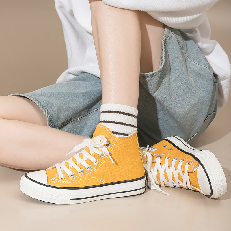 Zapatos de lona de alta talla de mujer amarillo clásico 2026 primavera al por mayor zapatos de tabla blanca de moda zapatos de alta altura
