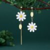 Design asymmetrical earrings, trend of season, flowered