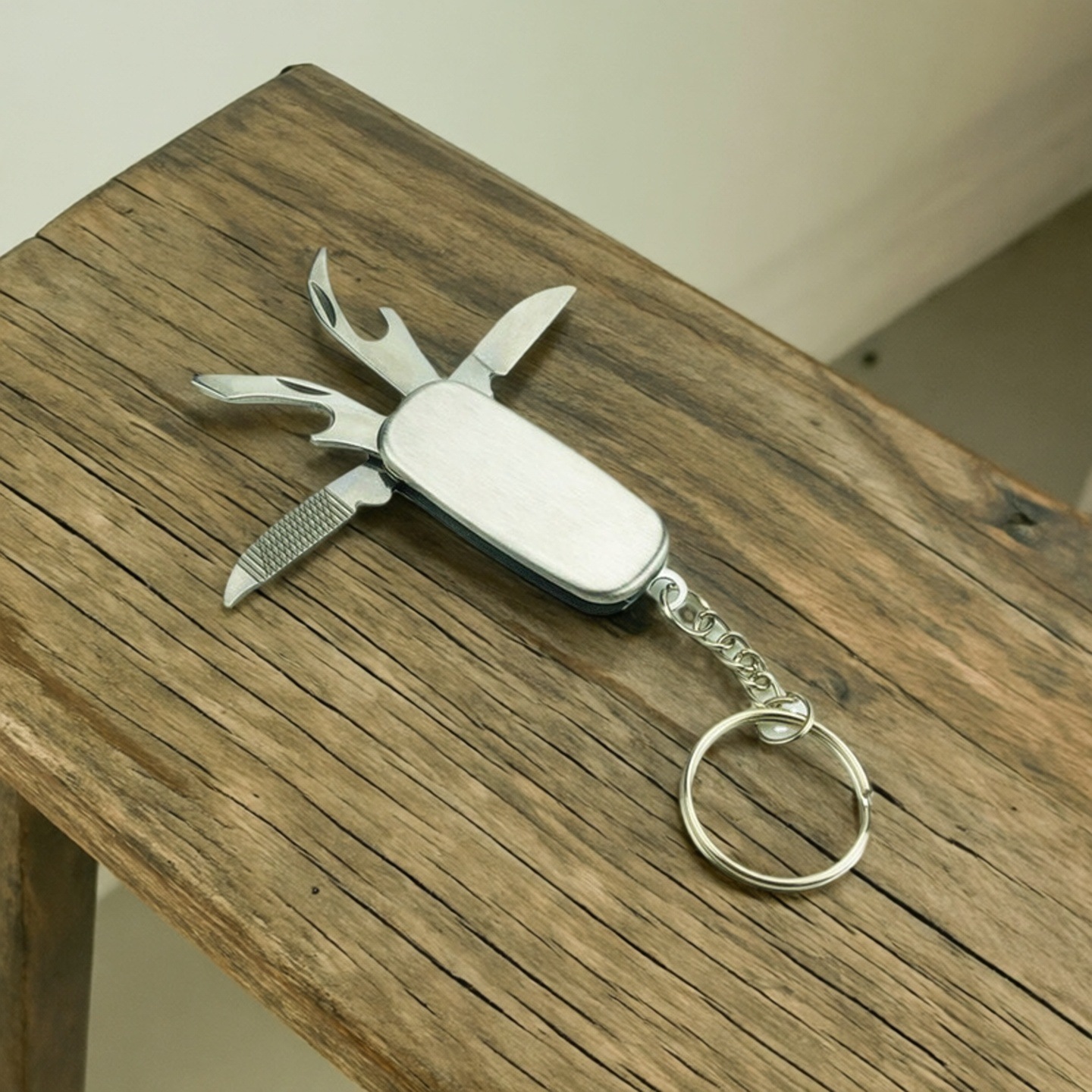 批发多功能弹子刀折叠4开不锈钢小礼品军刀钥匙圈开瓶器加印LOGO