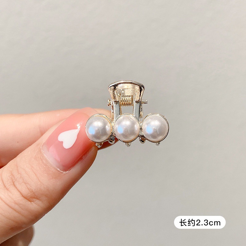 Pequeñas pinzas de cabello de perla temperamento feminino medio agarrado pinzas de cabello de borde pequeño adornamiento de cabeza de alto nivel no lastimar pinzas de cabello