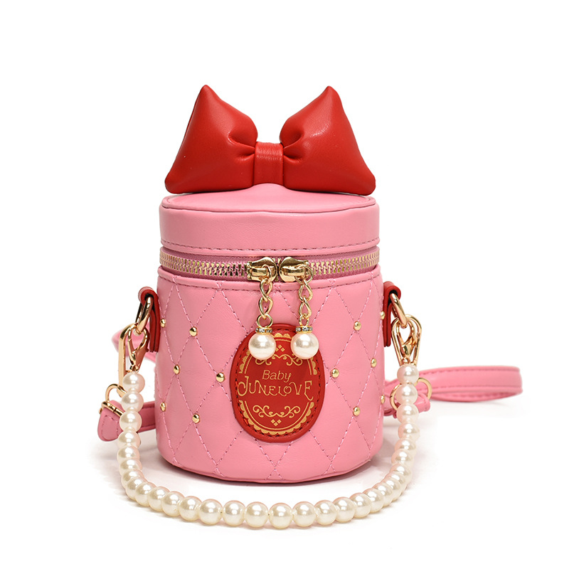 Bolso para niños coreano 2025, nuevo lindo bolso de arco, bolso de cubo, bolso de hombro de cadena de perlas de chicas