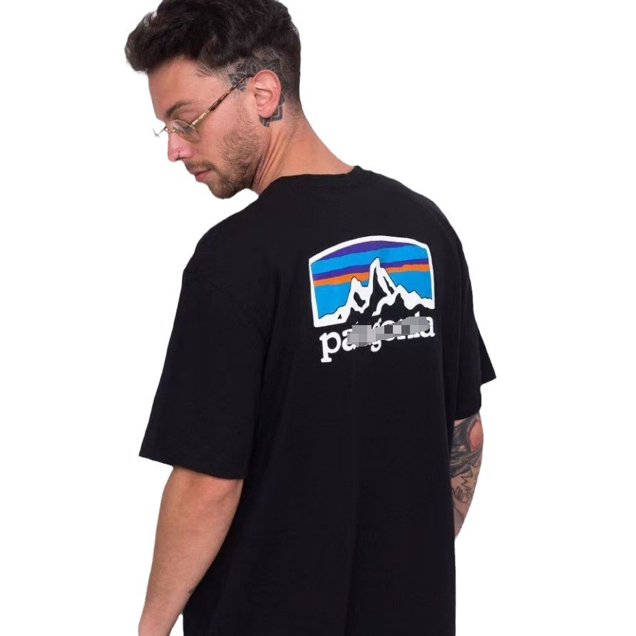 Comercio exterior verano montaña impresión casual suelta cuello redondo camiseta de manga corta hombres y mujeres parejas
