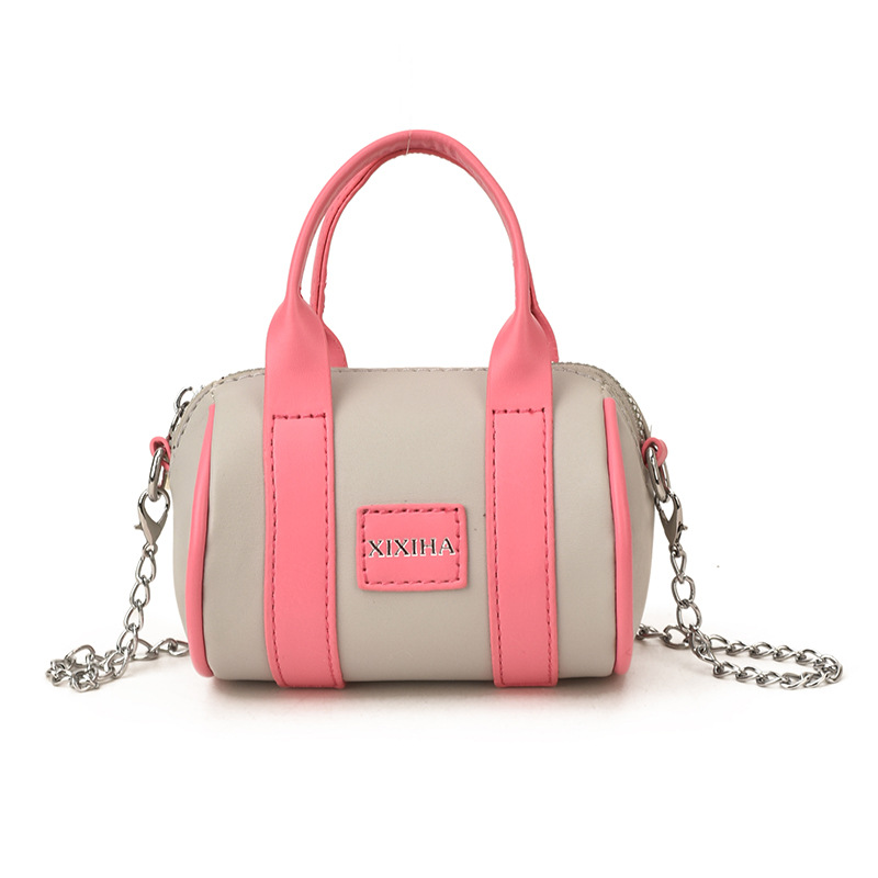 Bolsa de almohada cilíndrica de moda de contraste para niños y niñas bolsas de cadena mini lindas para bebés 2026 nuevas bolsas de accesorios para niños