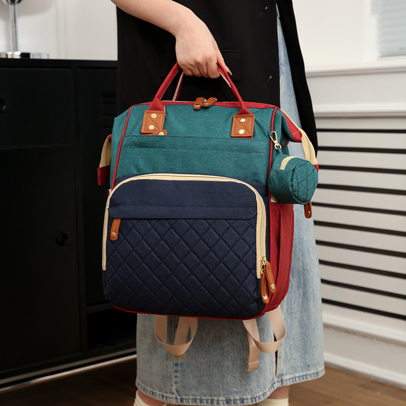 Momia bolsa de gran capacidad portátil madre-niño bolsa multifuncional seco y húmedo separación antirrobo mochila portátil al por mayor