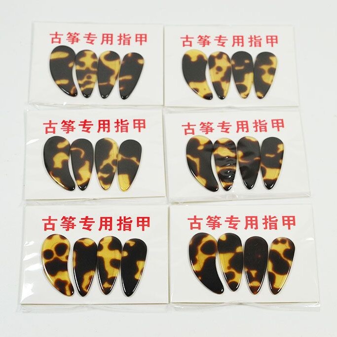 Manufacturers wholesale celluloid flat natural color guzheng nails adult children guzheng nails Manufacturers wholesale celluloid flat natural color guzheng nails adult children guzheng nails