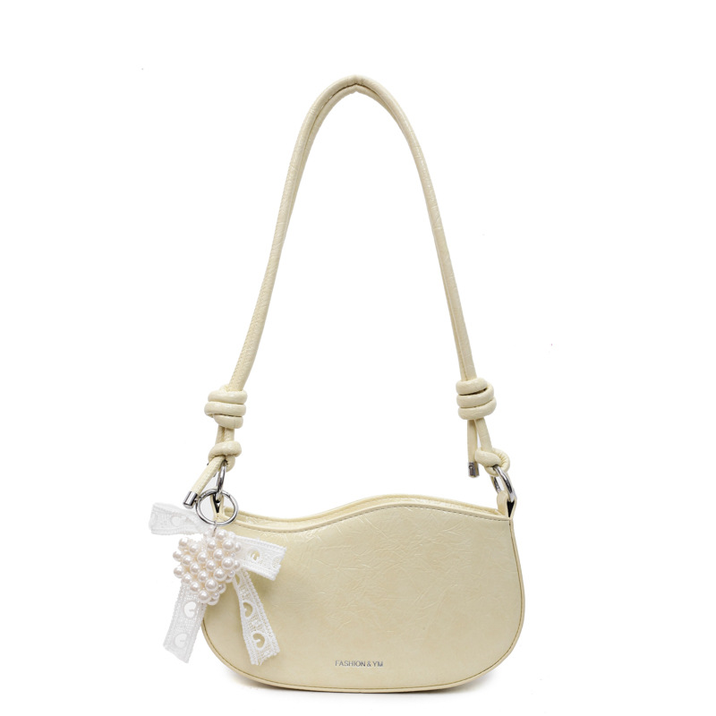 Bolsos pequeños de alta calidad 2025 verano nuevo estilo bolso femenino diseño de nicho bolso de hombro moda patrón de agarre de mano bolso de mensajero