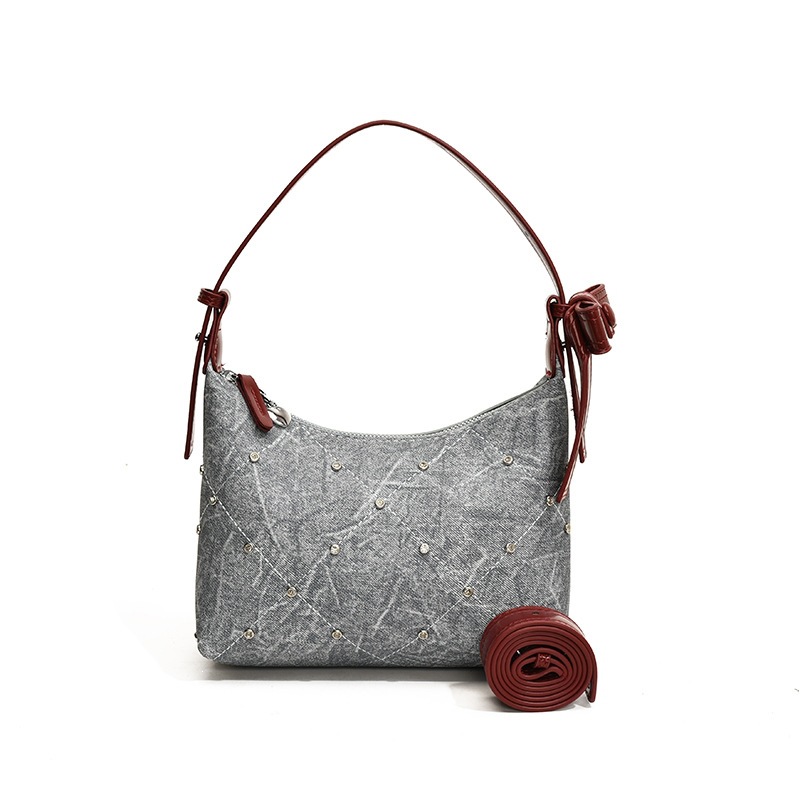 Diseño de color chocante empalme brazo bolso de mujer verano nuevo estilo de viaje diario versátil portátil de hombro mochila