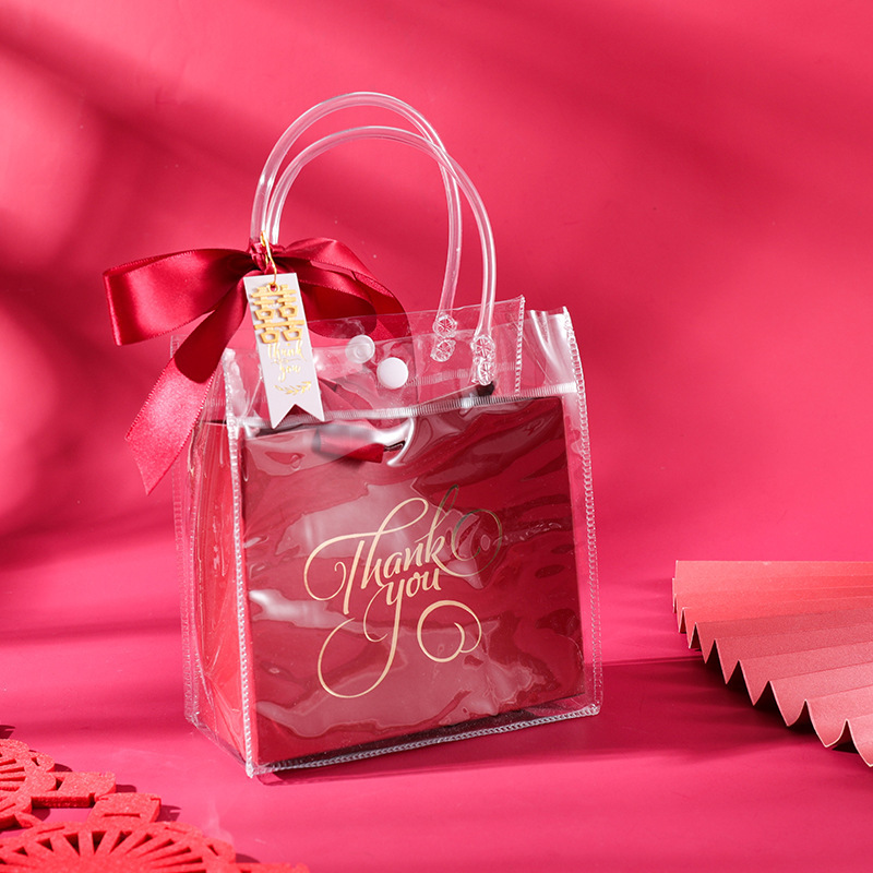 Spot PVC transparente bolso de mano con bolsa de regalo dulces de boda té con leche de boda compras pequeño embalaje de plástico al por mayor