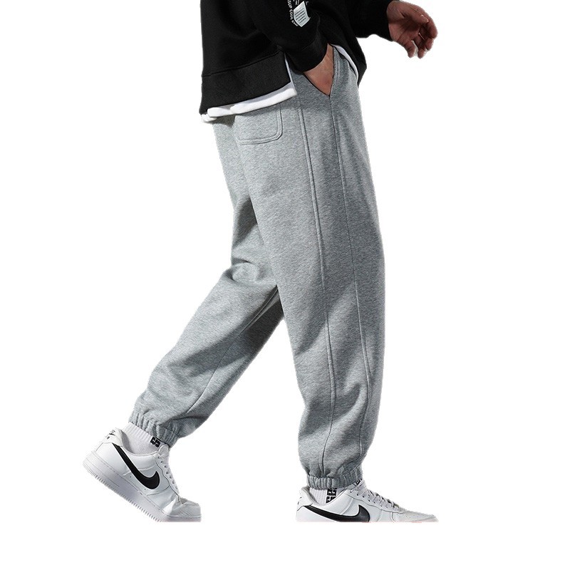 Pantalones deportivos casuales transfronterizos para hombres y mujeres otoño y invierno pantalones grises para hombres sueltos piezos de invierno pantalones gruesos de lana grande