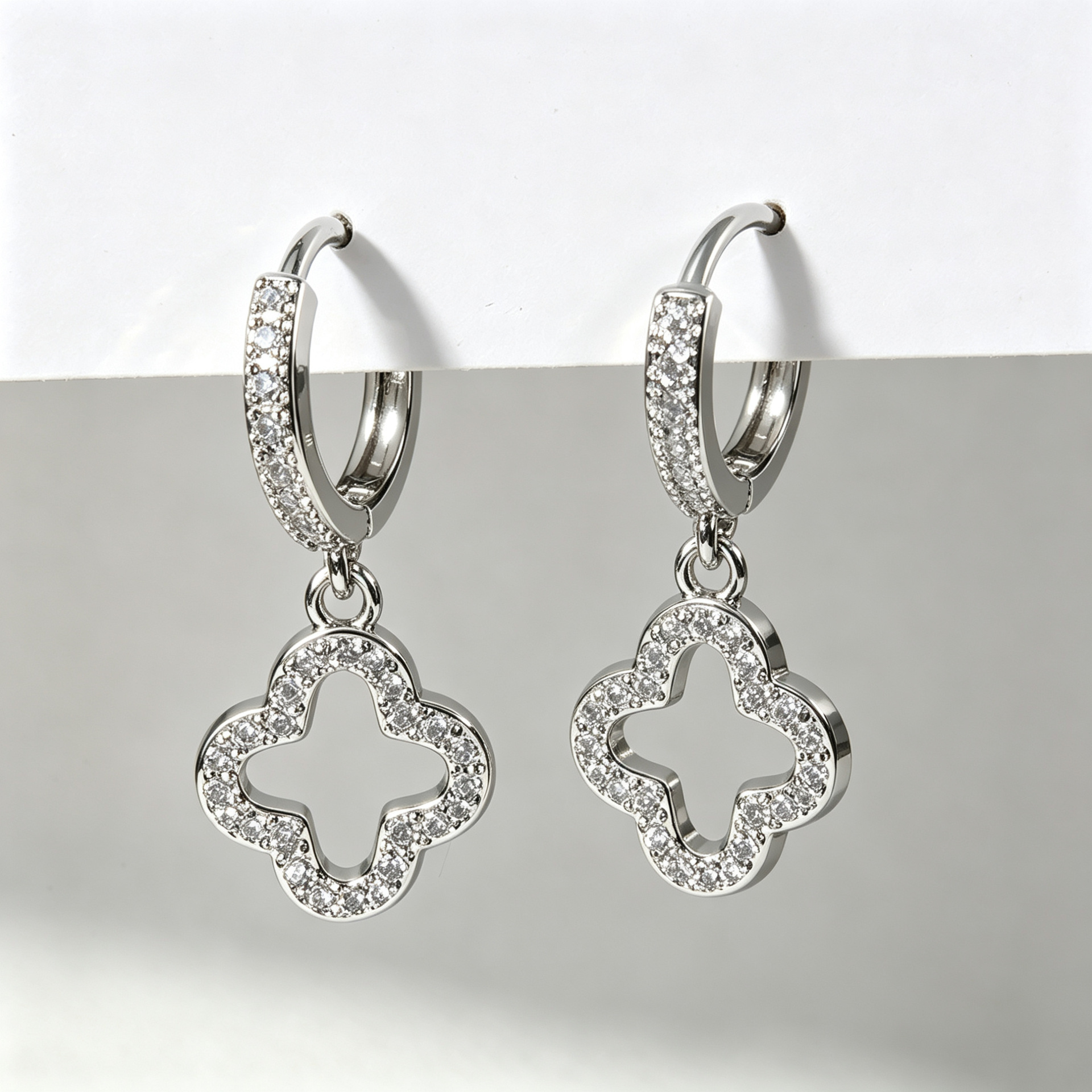 Amazon's Popular European and American Style Four-Leaf Clover Earrings for Women, Copper Zircon Hollow Design, Light Luxury, High-End Fashion Commuter Earrings for Women