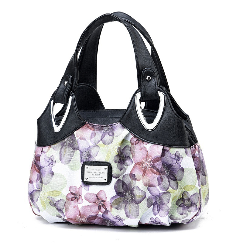 Factory wholesale contrast color New European and American fashion trend large capacity foreign style printing simple women's bag a generation of hair Factory wholesale contrast color New European and American fashion trend large capacity foreign style printing simple women's bag a generation of hair